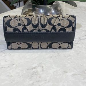 Coach Long Wallet/Billfold in Signature Canvas.